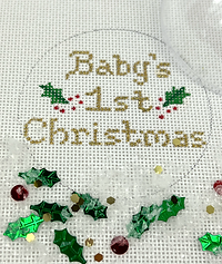 Christmas Ornament w/ Clear Dome Cover & Confetti – “Baby’S 1St Christmas” w/ Holly – Gold Letters XMD-12